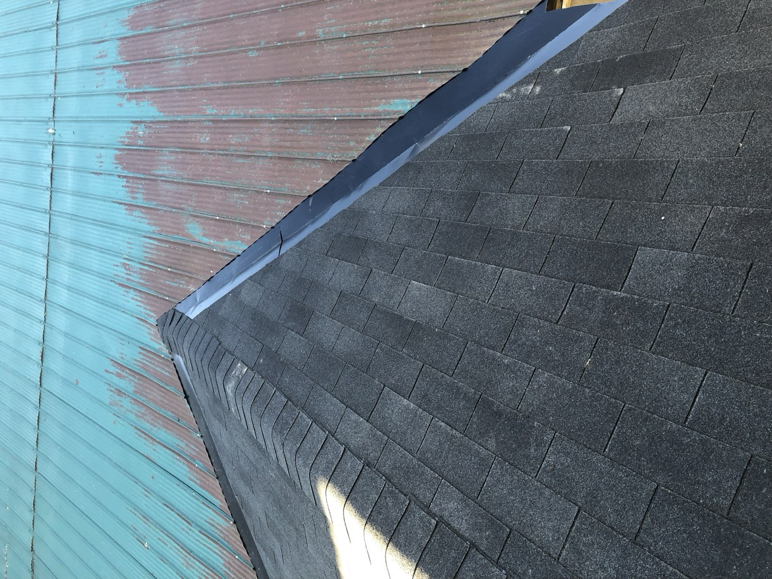 New IKO architectural shingles and a capped ridge on a Kitchener re-roof